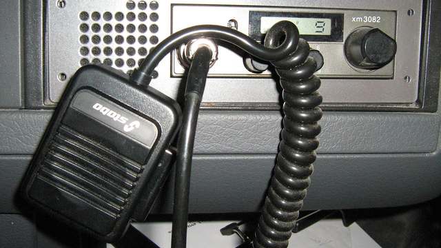 A CB radio mounted in a truck