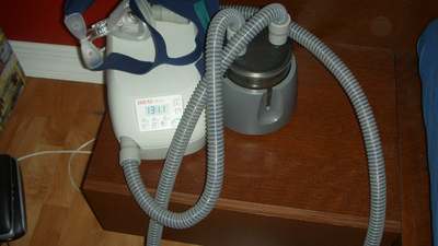 A continuous positive airway pressure machine on a table