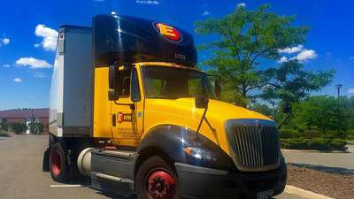 An Estes truck in a parking lot