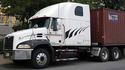A Mack Vision truck with a sleeper cab
