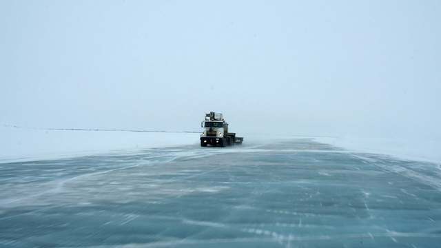 Trucks on the Mackenzie River ice road in the Northwest Territories