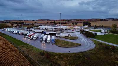 Trucks parked at a highway rest stop in Ingersoll, Ontario