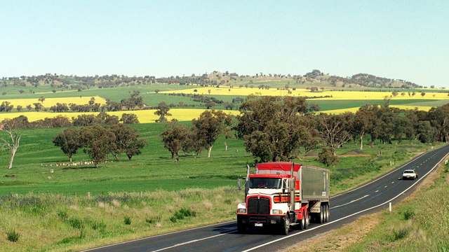 A truck on a rural highway, the trip a plan has to fit around